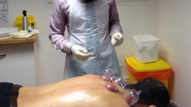 Dr Suleman with a patient