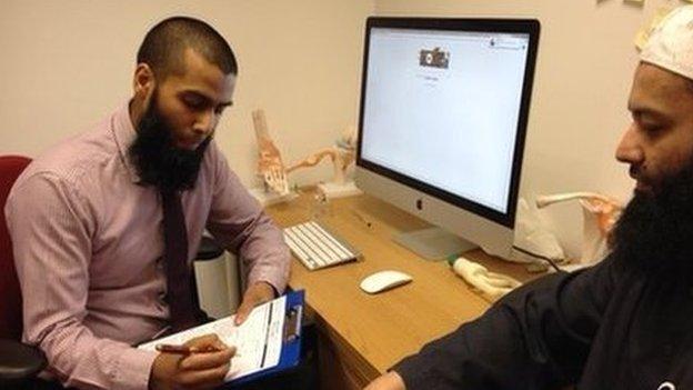 Dr Suleman with a patient