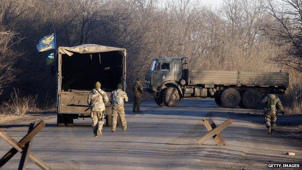 Rebels hand bodies over to Ukrainian forces at Debaltseve