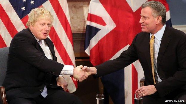 Boris Johnson shakes Bill De Blasio's hand.