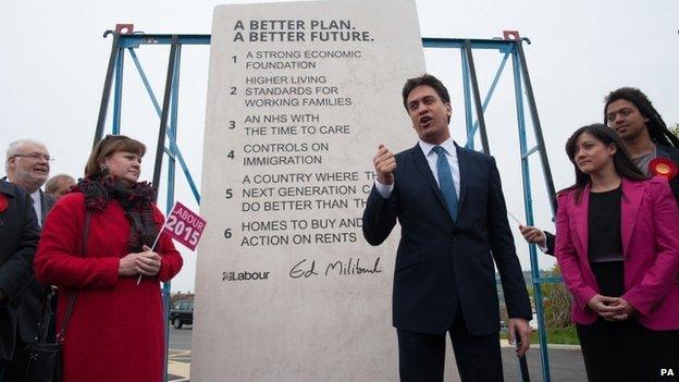 Labour leader Ed Miliband unveils Labour's pledges carved into a stone plinth in Hastings during General Election campaigning