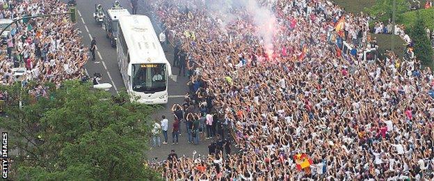 Big crowds gathered outside the Bernabeu before kick off to greet the Real Madrid team coach