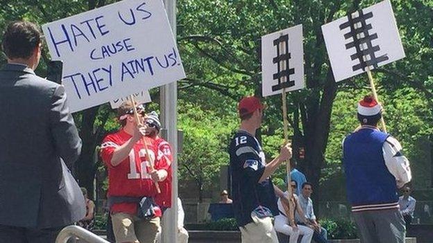 Four Pats fans protest at NFL HQ