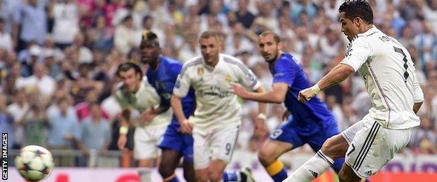 Real Madrid's Cristiano Ronaldo scores from the penalty spot against Juventus in the Champions League semi-final