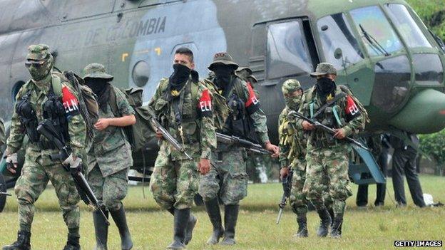 Demobilized members of the ELN (National Liberation Army) arrive in Cali, Colombia on July 16, 2013