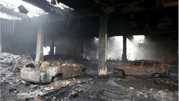 Burned cars inside the factory in Valenzuela, Metro Manila (14 May 2015)