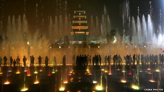 People view the music fountain during Christmas celebrations at the Big Wild Goose Pagoda Square on Christmas Eve on 24 December 2008 in Xian of Shaanxi Province, China