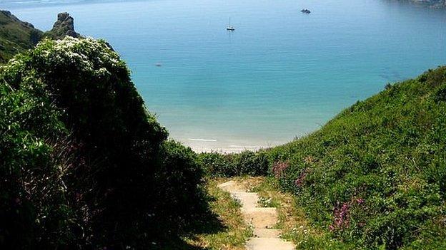 Steps down to Guernsey's Petit Port Bay