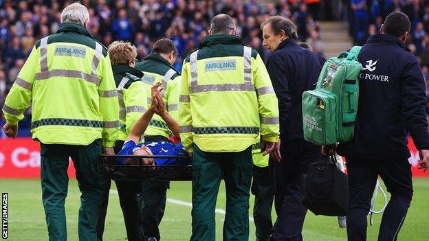 Matty James is taken off on a stretcher during Leicester's win over Southampton on 9 May