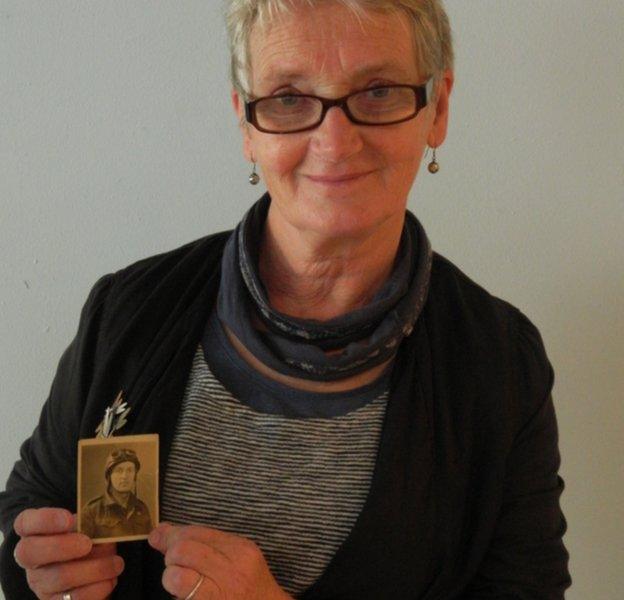 Susan Judd with photograph of father