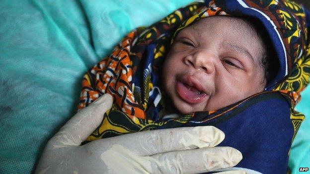 Baby recently delivered (not in a power cut hospital in Accra)