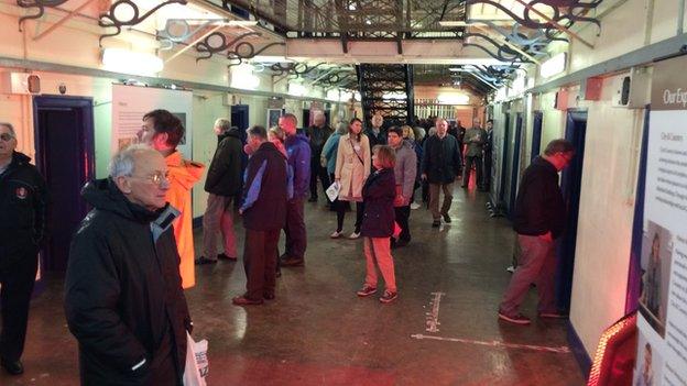 Members of the public inside Gloucester Prison