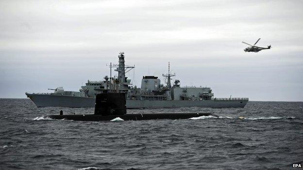 A Swedish Navy submarine (front) participates in Nato's Dynamic Mongoose anti-submarine exercise in the North Sea off the coast of Norway, 4 May 2015.