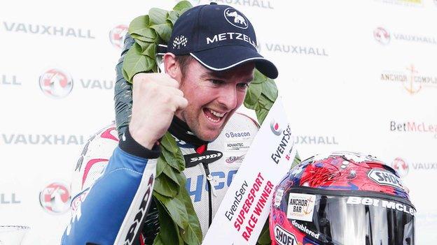 Alastair Seeley celebrates his 13th North West 200 victory