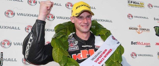 Ryan Farquhar celebrates after his Supertwins triumph on Thursday evening