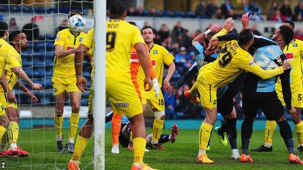 Paul Hayes opens the scoring for Wycombe