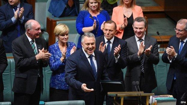 Australian cabinet applaud Treasurer Joe Hockey after his budget speech (12 May 2015)