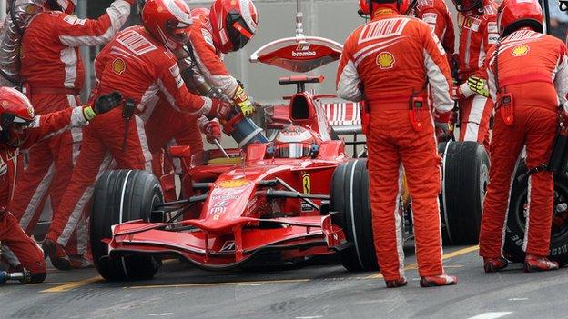 A Ferrari being refuelled in 2008