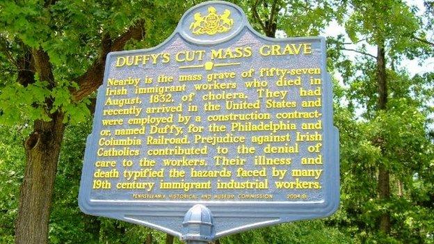 A memorial stone to those who died at Duffy's Cut