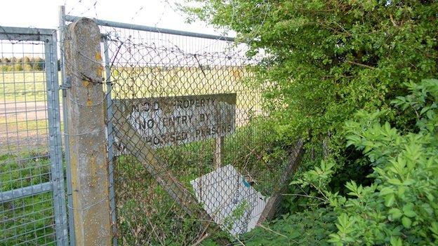 Hole in fence at Bassingbourn Barracks