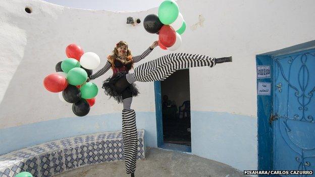 A performer on silts at the FiSahara in Dakhla camp, Algeria