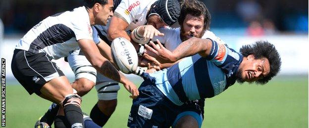 Filo Paulo slips the ball away during Blues' win over Zebre