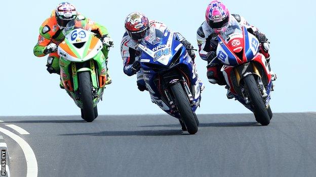 Alastair Seeley (centre) battles with Glenn irwin and Lee Johnston in an exciting Supersport race