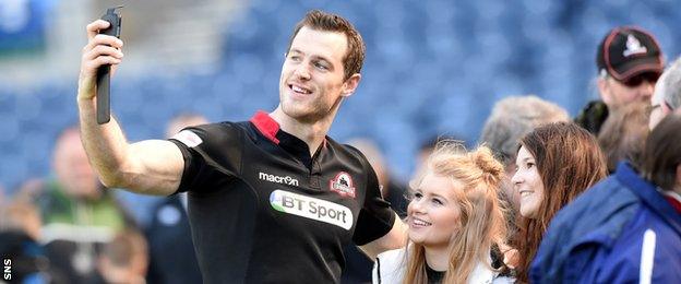 Edinburgh Tim Visser poses for pictures with fans