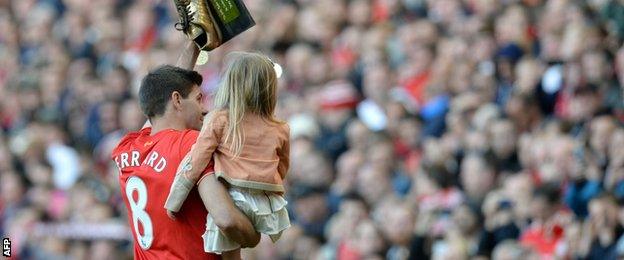 Steven Gerrard on the pitch with his daughters