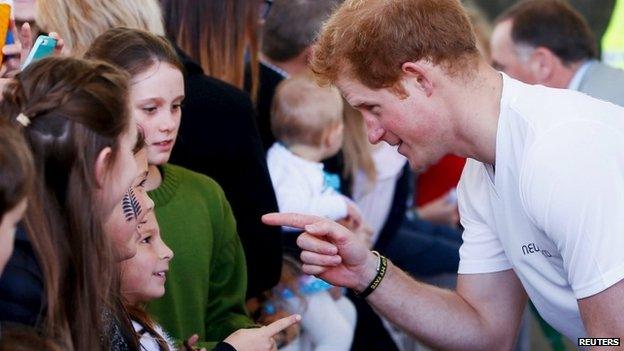 Prince Harry meeting the crowds during a walkabout in Auckland