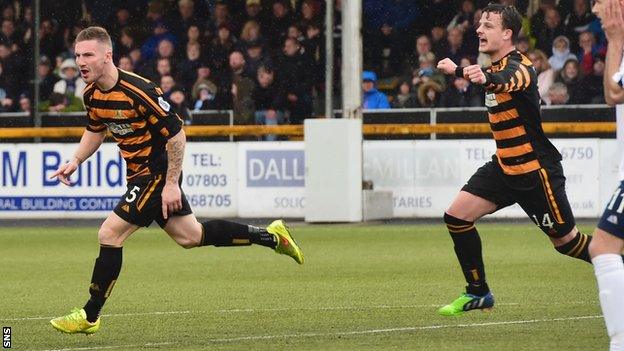 Alloa's Daryll Meggatt (left) after putting his side 3-0 up