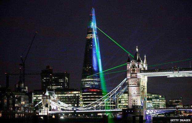 Laser lights shine from The Shard over Tower Bridge 5 July 2012