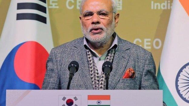 Mr Modi says his government is committed to improve business environment in India