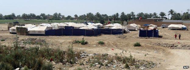 Tents housing families who fled the city of Ramadi after it was seized by Islamic State (IS) group militants in Bzeibez, on the south-western frontier of Baghdad with Anbar province, on 18 May 2015