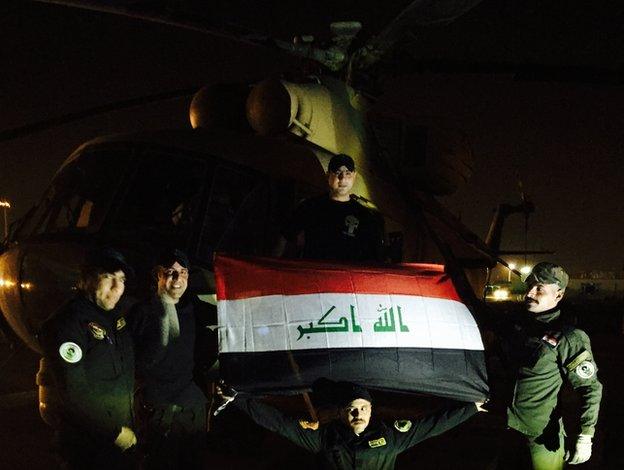 Iraqi pilots pose in front 19 May 2015