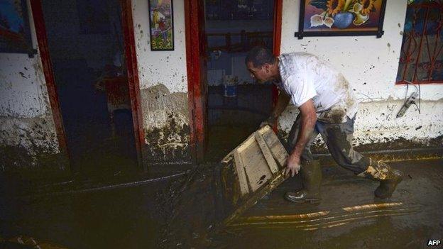 View of the inside of a house after a landslide in Salgar on 18 May, 2015.