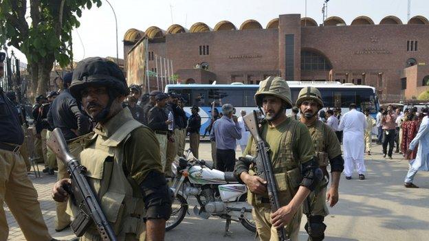 Pakistani Rangers gather for a rehearsal of security arrangements for the Zimbabwe team outside the Gaddafi Cricket Stadium in Lahore on May 16, 2015.