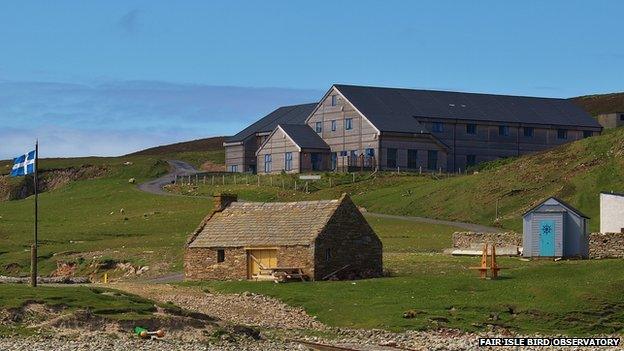 The Fair Isle bird observatory, pictured in the background, has recorded the migration patterns of birds.