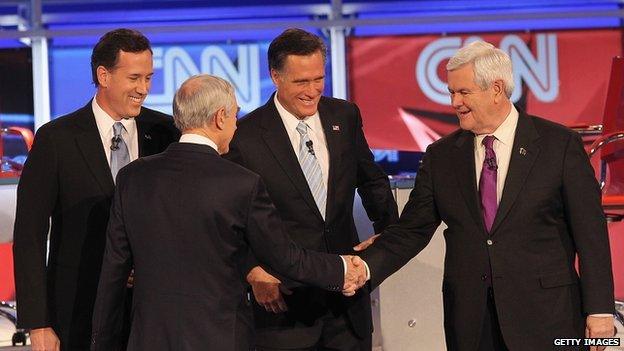 Republican debate participants shake hands in 2012.