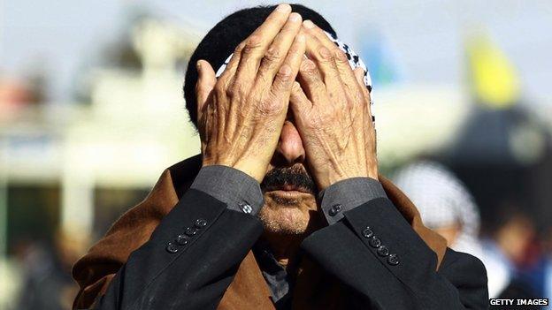 An Iraqi mourns the death of his son in Ramadi.