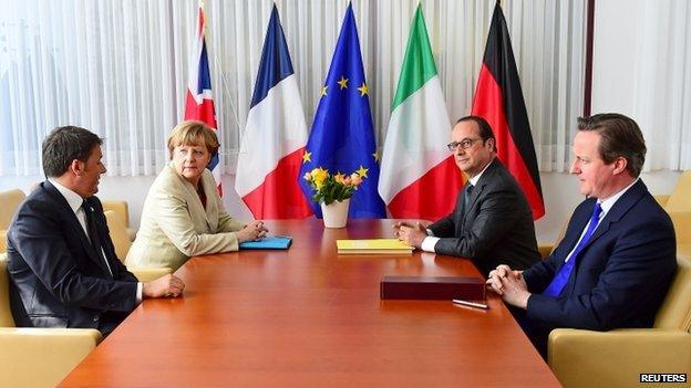 Italian Prime Minister Matteo Renzi , German Chancellor Angela Merkel, French President Francois Hollande and British Prime Minister David Cameron take part in a meeting during a European Union extraordinary summit