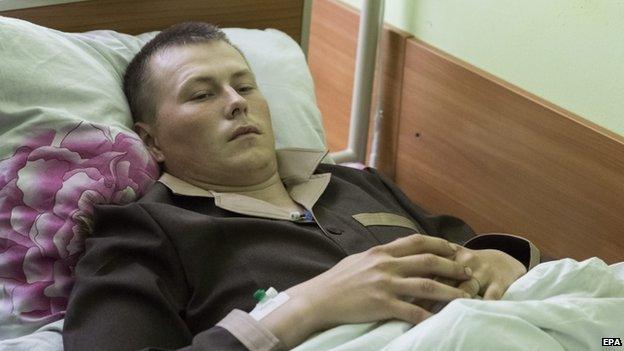 Alexander Alexandrov lies on a bed at a hospital in Kiev, Ukraine, 19 May 2015.