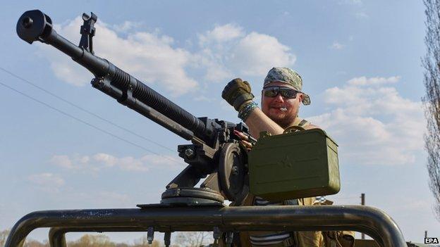 A Ukrainian servicemen at a check point near Schastye, Luhansk area, 12 April 2015.