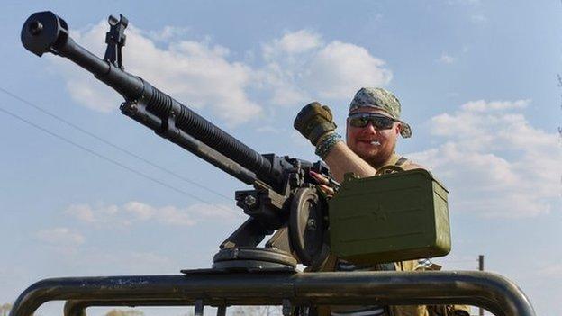 A Ukrainian servicemen at a check point near Schastye, Luhansk area, 12 April 2015.