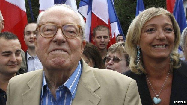 Marine Le Pen and her father Jean-Marie Le Pen arrive for a meeting in Cormont, in August 2010.