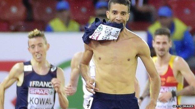 French steeplechaser Mahiedine Mekhissi-Benabbad removes his vest