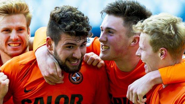 Nadir Ciftci and John Souttar (centre) celebrate a Dundee United goal