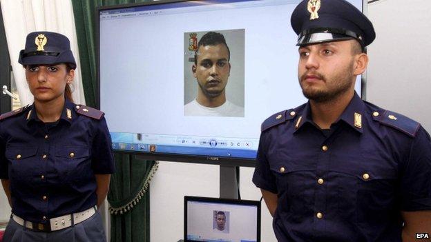 Two police officers at a press conference by Italian police in Milan, Italy, 20 May 2015 about the arrest of a Moroccan man, Touil Abdelmajid, on a Tunisian arrest warrant