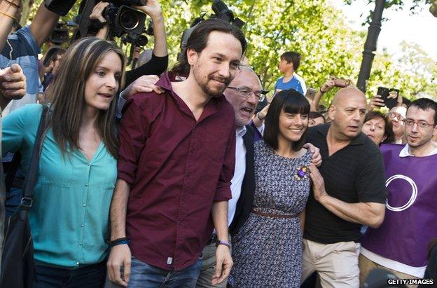 Anti-austerity political party Podemos' leader Pablo Iglesias (2nd left) and candidate for regional government presidency Antonio Montiel (3rd left) at Valencia University on 15 May 2015