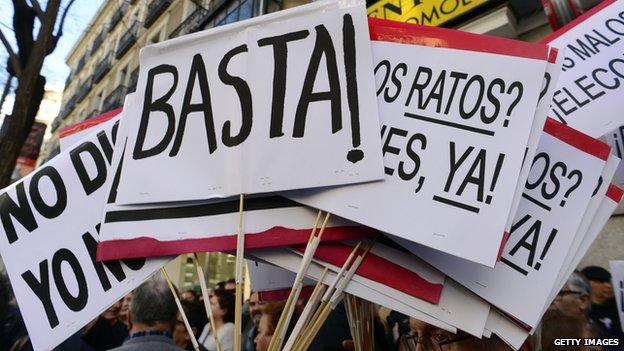 Placards during a demonstration outside the Spanish Popular Party (PP) headquarters in Madrid